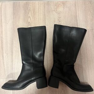 Elegant Black Leather Heeled Boots